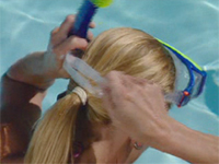 Putting on the mask strap