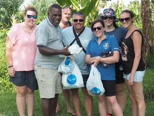 Vanuatu - Delivering some school supplies.